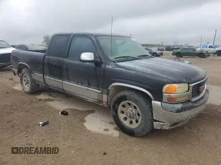 1999 GMC New Sierra 1500 SLE with VIN 2GTEC19TXX1539997, listed as a Copart auction lot 50202325 with 259,579 mi miles and Salvage Title. Bid and sale history available at carsss.com. Image 4.