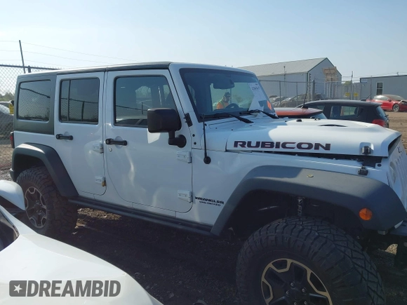 2015 Jeep Wrangler Unlimited Rubicon with VIN 1C4BJWFG1FL602412, listed as a IAAI auction lot 42065619 with 109,070 mi miles. Bid and sale history available at carsss.com. Image 13.
