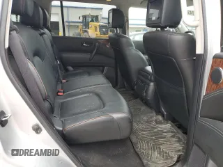 2018 Nissan Armada SL z VIN JN8AY2NC5J9553496, wystawiony jako Copart lot #61430915 z przebiegiem 150 506 mil mil oraz Czysty tytuł • Clean title. Historia ofert i sprzedaży dostępna na DreamBid. Obrazek 11.