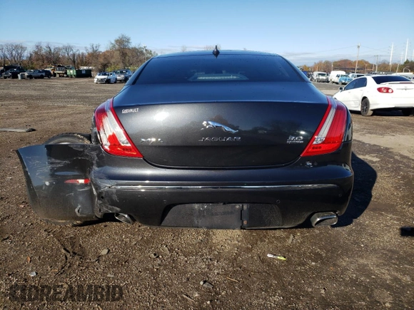 2015 Jaguar XJ Portfolio with VIN SAJWJ2GD1F8V77420, listed as a Copart auction lot 81786334 with 129,190 mi miles and Salvage title. Bid and sale history available at DreamBid. Image 6.