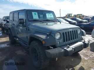 2014 Jeep Wrangler Unlimited Sport with VIN 1C4BJWDG9EL309763, listed as a IAAI auction lot 41378132 with 117,029 mi miles. Bid and sale history available at carsss.com. Image 1.