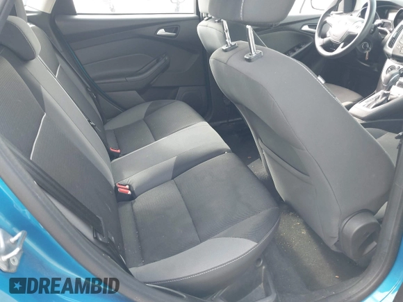 2014 Ford Focus SE z VIN 1FADP3K23EL396126, wystawiony jako IAAI lot #42380189 z przebiegiem 143 298 mil mil oraz . Historia ofert i sprzedaży dostępna na DreamBid. Obrazek 8.