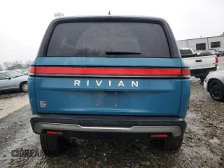 2024 Rivian R1S Adventure z VIN 7PDSGABA1RN031444, wystawiony jako Copart lot #43312765 z przebiegiem Nie podano mil oraz Szkody całkowita. Historia ofert i sprzedaży dostępna na DreamBid. Obrazek 6.