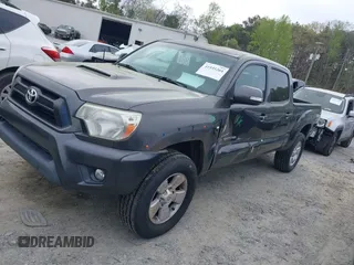 2015 Toyota Tacoma with VIN 3TMMU4FNXFM073978, listed as a IAAI auction lot 41935264 with 132,806 mi miles and . Bid and sale history available at DreamBid. Image 14.