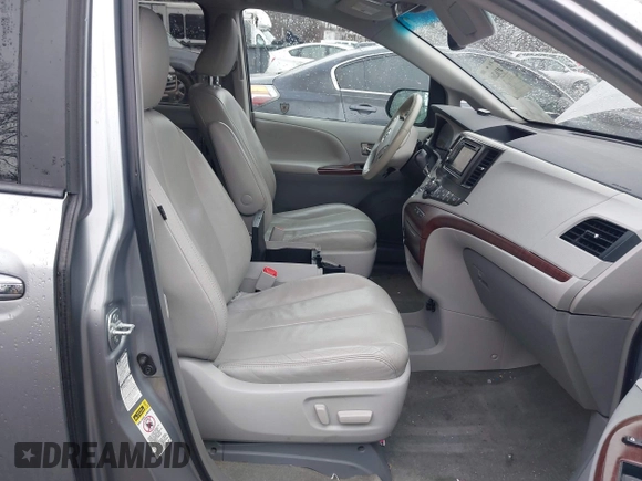 2013 Toyota Sienna XLE with VIN 5TDDK3DC5DS070243, listed as a IAAI auction lot 41162661 with 149,672 mi miles and . Bid and sale history available at DreamBid. Image 5.