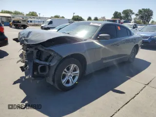 2019 Dodge Charger SXT with VIN 2C3CDXBGXKH659890, listed as a Copart auction lot 58011735 with 112,293 mi miles and Salvage title. Bid and sale history available at DreamBid. Image 1.