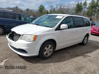 2012 Dodge Grand Caravan SXT with VIN 2C4RDGCGXCR248859, listed as a IAAI auction lot 41829411 with 111,515 mi miles and . Bid and sale history available at DreamBid. Image 2.