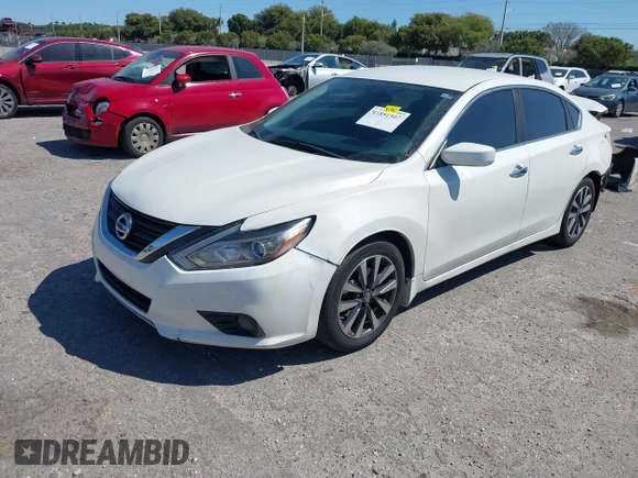 2016 Nissan Altima SV with VIN 1N4AL3AP9GC135114, listed as a IAAI auction lot 41851507 with 127,033 mi miles and . Bid and sale history available at DreamBid. Image 2.