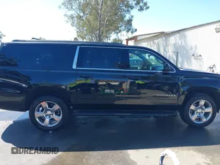 2017 Chevrolet Suburban LS z VIN 1GNSCGKC1HR338621, wystawiony jako IAAI lot #41696381 z przebiegiem 194 687 mil mil oraz . Historia ofert i sprzedaży dostępna na DreamBid. Obrazek 14.