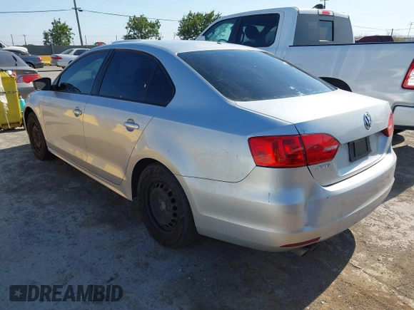 2014 Volkswagen Jetta S with VIN 3VW2K7AJ0EM391770, listed as a IAAI auction lot 42677433 with 200,032 mi miles and . Bid and sale history available at DreamBid. Image 3.