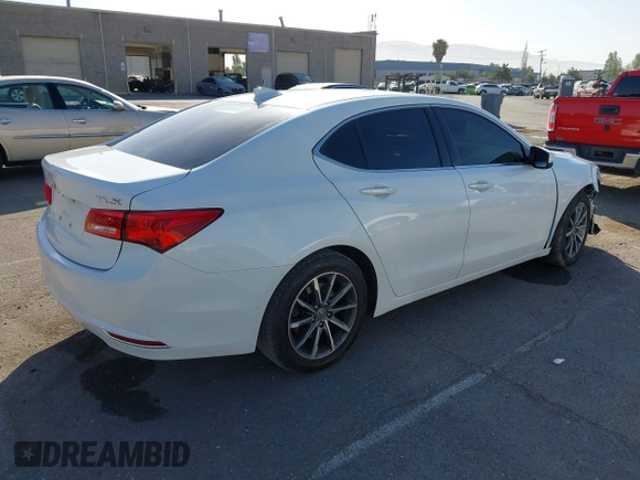 2020 Acura TLX with VIN 19UUB1F3XLA014040, listed as a IAAI auction lot 42385420 with 140,740 mi miles and . Bid and sale history available at DreamBid. Image 4.
