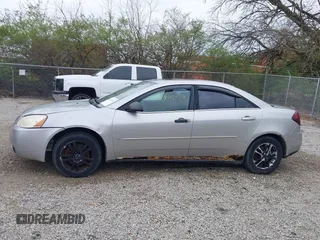 2006 Pontiac G6 6-Cyl z VIN 1G2ZG558064154096, wystawiony jako IAAI lot #41987316 z przebiegiem 221 130 mil mil oraz . Historia ofert i sprzedaży dostępna na DreamBid. Obrazek 15.