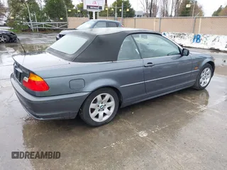 2001 BMW 3 Series 325Ci with VIN WBABS33431JY41788, listed as a IAAI auction lot 41557645 with 199,732 mi miles. Bid and sale history available at carsss.com. Image 4.