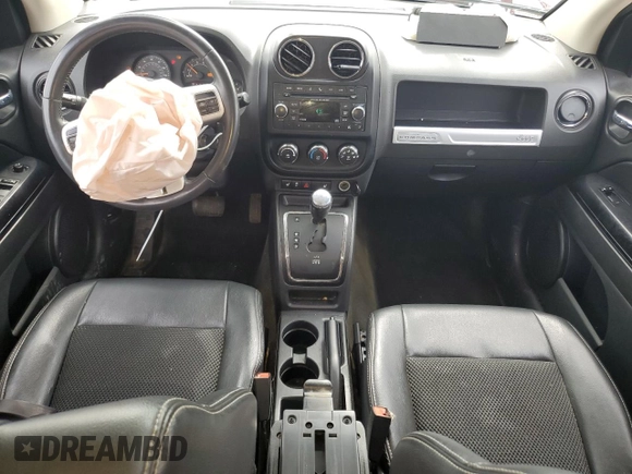 2016 Jeep Compass Sport SE with VIN 1C4NJDBB0GD759999, listed as a Copart auction lot 56983255 with 69,548 mi miles and Salvage title. Bid and sale history available at DreamBid. Image 8.