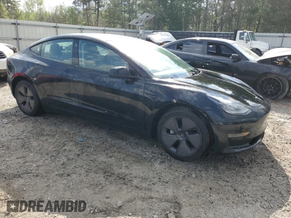 2023 Tesla Model 3 with VIN 5YJ3E1EA1PF437099, listed as a Copart auction lot 51647135 with 122,420 mi miles and Salvage Title. Bid and sale history available at carsss.com. Image 4.