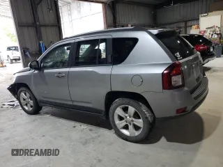 2016 Jeep Compass Sport with VIN 1C4NJCBA1GD512864, listed as a Copart auction lot 56297115 with 216,693 mi miles and Salvage title. Bid and sale history available at DreamBid. Image 2.