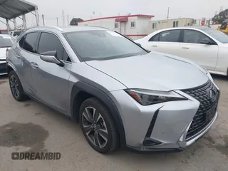 2023 Lexus UX 250h with VIN JTHX6JBH6P2143926, listed as a IAAI auction lot 42180779 with 65,106 mi miles and . Bid and sale history available at DreamBid. Image 1.