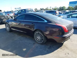2011 Jaguar XJ with VIN SAJWA1CB8BLV05958, listed as a IAAI auction lot 40799422 with 80,193 mi miles. Bid and sale history available at carsss.com. Image 3.