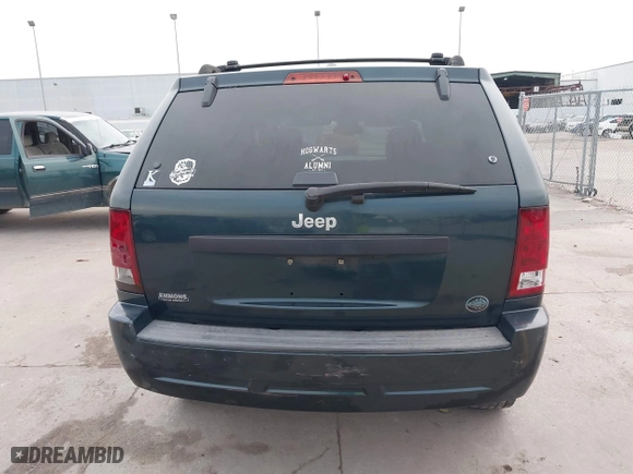 2005 Jeep Grand Cherokee Laredo with VIN 1J4GS48K45C677011, listed as a IAAI auction lot 41121018 with 210,814 mi miles. Bid and sale history available at carsss.com. Image 16.