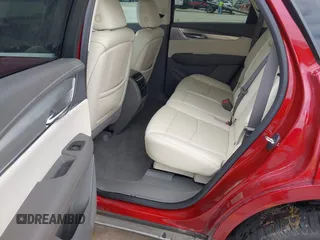 2020 Cadillac XT5 Premium Luxury FWD z VIN 1GYKNCRS8LZ228516, wystawiony jako IAAI lot #42409513 z przebiegiem 54 765 mil mil oraz . Historia ofert i sprzedaży dostępna na DreamBid. Obrazek 8.