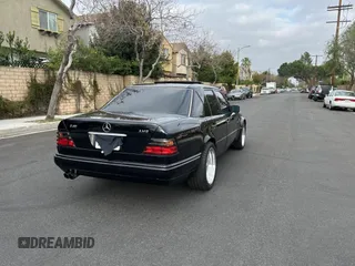 1994 Mercedes-Benz 400 with VIN WDBEA34E6RC103296, listed as a Copart auction lot 51020195 with 186,132 mi miles and Clean Title. Bid and sale history available at carsss.com. Image 4.