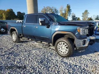 2020 GMC Sierra 2500HD SLT z VIN 1GT49NE73LF274319, wystawiony jako Copart lot #75348024 z przebiegiem 86 908 mil mil oraz Nie do naprawy • Non repairable. Historia ofert i sprzedaży dostępna na DreamBid. Obrazek 4.