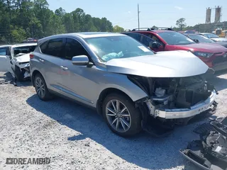 2019 Acura RDX w/Technology Pkg with VIN 5J8TC2H56KL028081, listed as a IAAI auction lot 40042142 with 76,899 mi miles. Bid and sale history available at carsss.com. Image 1.