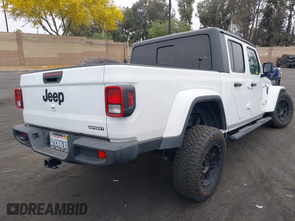 2020 Jeep Gladiator Sport S with VIN 1C6HJTAG9LL194454, listed as a IAAI auction lot 42430339 with 90,461 mi miles and . Bid and sale history available at DreamBid. Image 4.