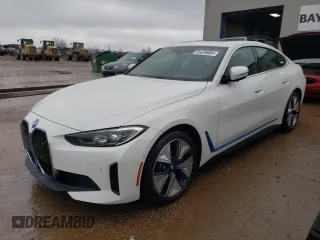 2024 BMW i4 xDrive40 with VIN WBY83FB03RFT14891, listed as a Copart auction lot 84236604 with 4,614 mi miles and Salvage Title. Bid and sale history available at carsss.com. Image 1.