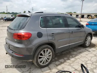 2012 Volkswagen Tiguan SE z VIN WVGAV7AX4CW001417, wystawiony jako Copart lot #61105865 z przebiegiem 168 110 mil mil oraz Czysty tytuł • Clean title. Historia ofert i sprzedaży dostępna na DreamBid. Obrazek 3.