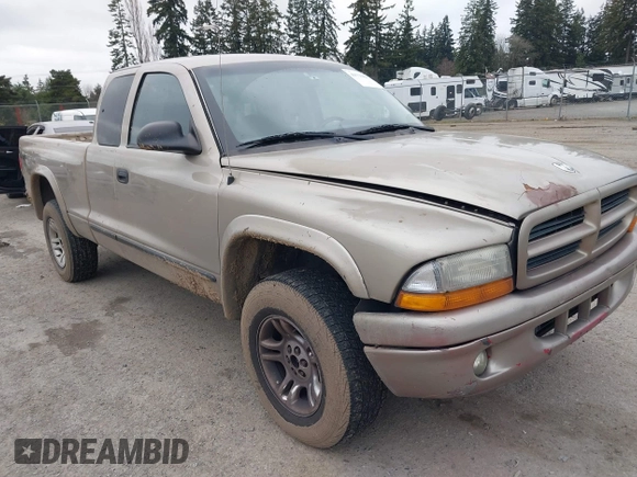 2004 Dodge Dakota SLT with VIN 1D7HG42N44S525545, listed as a IAAI auction lot 41739083 with 266,353 mi miles. Bid and sale history available at carsss.com. Image 1.