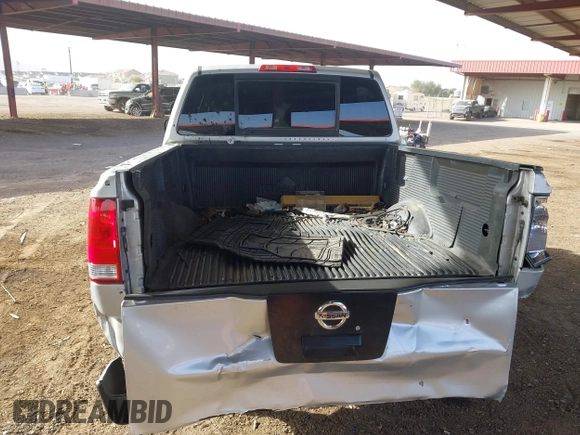 2011 Nissan Titan SV with VIN 1N6BA0ED6BN324977, listed as a IAAI auction lot 41275371 with 290,967 mi miles and . Bid and sale history available at DreamBid. Image 16.