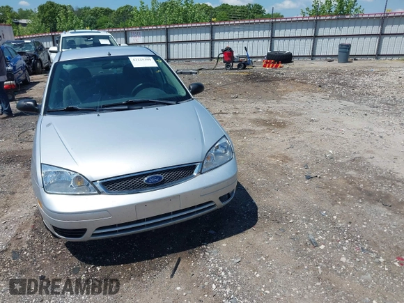 2007 Ford Focus S z VIN 1FAFP34N57W109953, wystawiony jako IAAI lot #42225399 z przebiegiem Nie podano mil oraz . Historia ofert i sprzedaży dostępna na DreamBid. Obrazek 12.