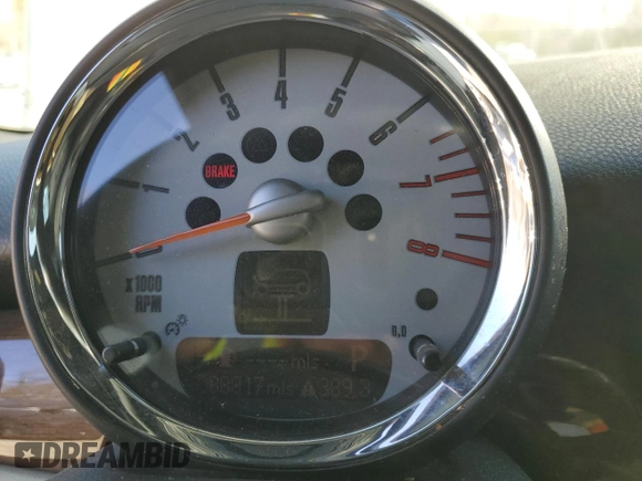2008 MINI Hardtop with VIN WMWMF33508TT66699, listed as a Copart auction lot 48233985 with 88,817 mi miles and Salvage Title. Bid and sale history available at DreamBid. Image 9.