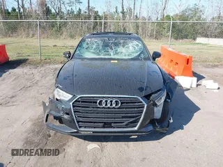 2017 Audi A3 Premium z VIN WAUAUGFF6H1041068, wystawiony jako IAAI lot #41534579 z przebiegiem 115 161 mil mil oraz . Historia ofert i sprzedaży dostępna na DreamBid. Obrazek 11.