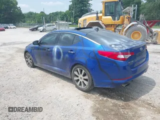 2013 Kia Optima SX with VIN 5XXGR4A68DG122057, listed as a IAAI auction lot 42421160 with 219,965 mi miles and . Bid and sale history available at DreamBid. Image 3.