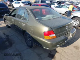 1998 Nissan Altima XE with VIN 1N4DL01D9WC178142, listed as a IAAI auction lot 42207069 with 204,834 mi miles and . Bid and sale history available at carsss.com. Image 3.