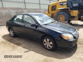 2009 Kia Spectra EX with VIN KNAFE221895631802, listed as a Copart auction lot 69585164 with 223,488 mi miles and Clean Title. Bid and sale history available at carsss.com. Image 4.