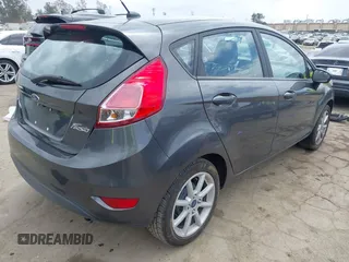 2018 Ford Fiesta SE with VIN 3FADP4EJ7JM127256, listed as a IAAI auction lot 41938121 with 83,211 mi miles. Bid and sale history available at carsss.com. Image 4.