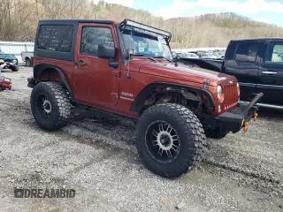 2014 Jeep Wrangler Sport with VIN 1C4AJWAG0EL184815, listed as a Copart auction lot 50307365 with 139,921 mi miles and Salvage title. Bid and sale history available at DreamBid. Image 4.