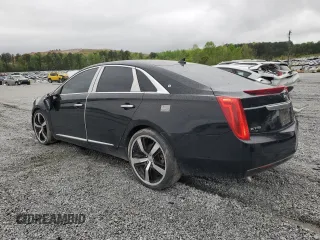 2014 Cadillac XTS Livery z VIN 2G61U5S33E9141464, wystawiony jako Copart lot #52071545 z przebiegiem 231 098 mil mil oraz Tytuł czysty. Historia ofert i sprzedaży dostępna na DreamBid. Obrazek 2.