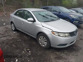 2010 Kia Forte LX with VIN KNAFT4A29A5259032, listed as a IAAI auction lot 41808367 with 173,924 mi miles. Bid and sale history available at carsss.com. Image 1.
