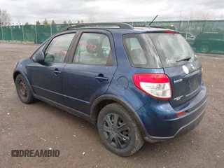 2010 Suzuki SX4 with VIN JS2YB5A37A6300142, listed as a IAAI auction lot 41956392 with 91,808 mi miles and . Bid and sale history available at DreamBid. Image 3.