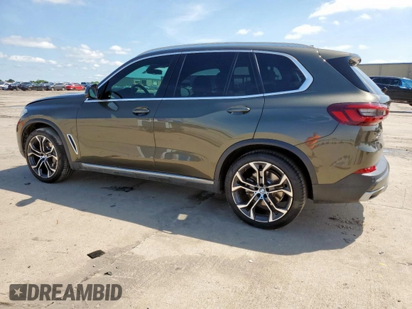2023 BMW X5 xDrive40i with VIN 5UXCR6C01P9P27041, listed as a Copart auction lot 59009585 with 45,568 mi miles and Salvage title. Bid and sale history available at DreamBid. Image 2.