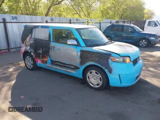 2008 Scion xB with VIN JTLKE50E381009787, listed as a IAAI auction lot 42140006 with 133,106 mi miles. Bid and sale history available at carsss.com. Image 1.