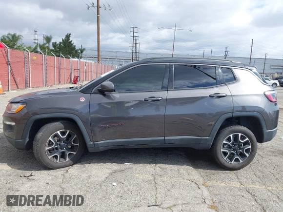 2021 Jeep Compass Trailhawk with VIN 3C4NJDDB6MT561074, listed as a IAAI auction lot 42125886 with 77,293 mi miles and . Bid and sale history available at DreamBid. Image 15.