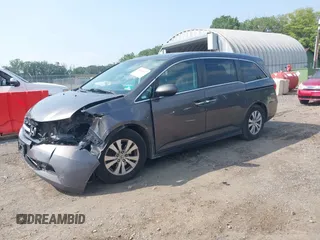 2014 Honda Odyssey EX-L with VIN 5FNRL5H6XEB121390, listed as a IAAI auction lot 42480217 with 291,766 mi miles and . Bid and sale history available at DreamBid. Image 2.