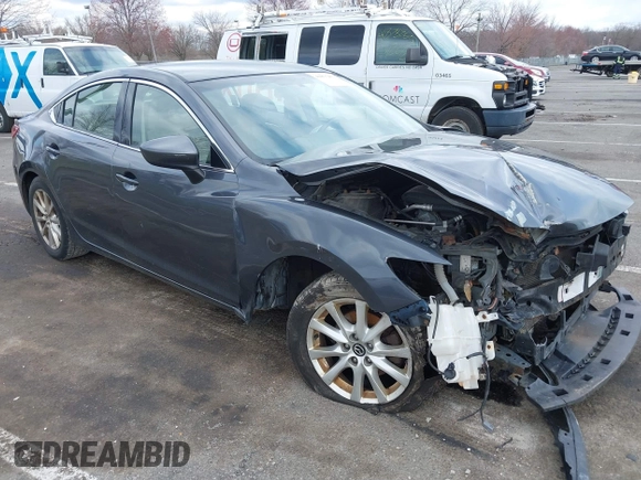2014 Mazda 6 i Sport with VIN JM1GJ1U51E1111018, listed as a IAAI auction lot 41875461 with 253,755 mi miles and . Bid and sale history available at DreamBid. Image 1.