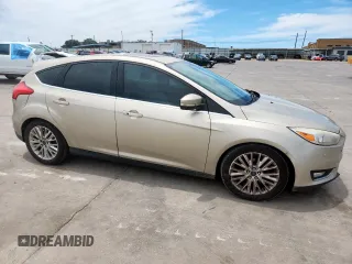 2017 Ford Focus Titanium with VIN 1FADP3N22HL266807, listed as a Copart auction lot 57071635 with 172,857 mi miles and Salvage title. Bid and sale history available at DreamBid. Image 4.