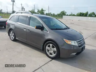 2012 Honda Odyssey Touring с VIN 5FNRL5H93CB071679, выставлен на аукционе IAAI как лот 42323102 с пробегом 313 968 миль миль и . История ставок и продаж доступна на DreamBid. Изображение 1.